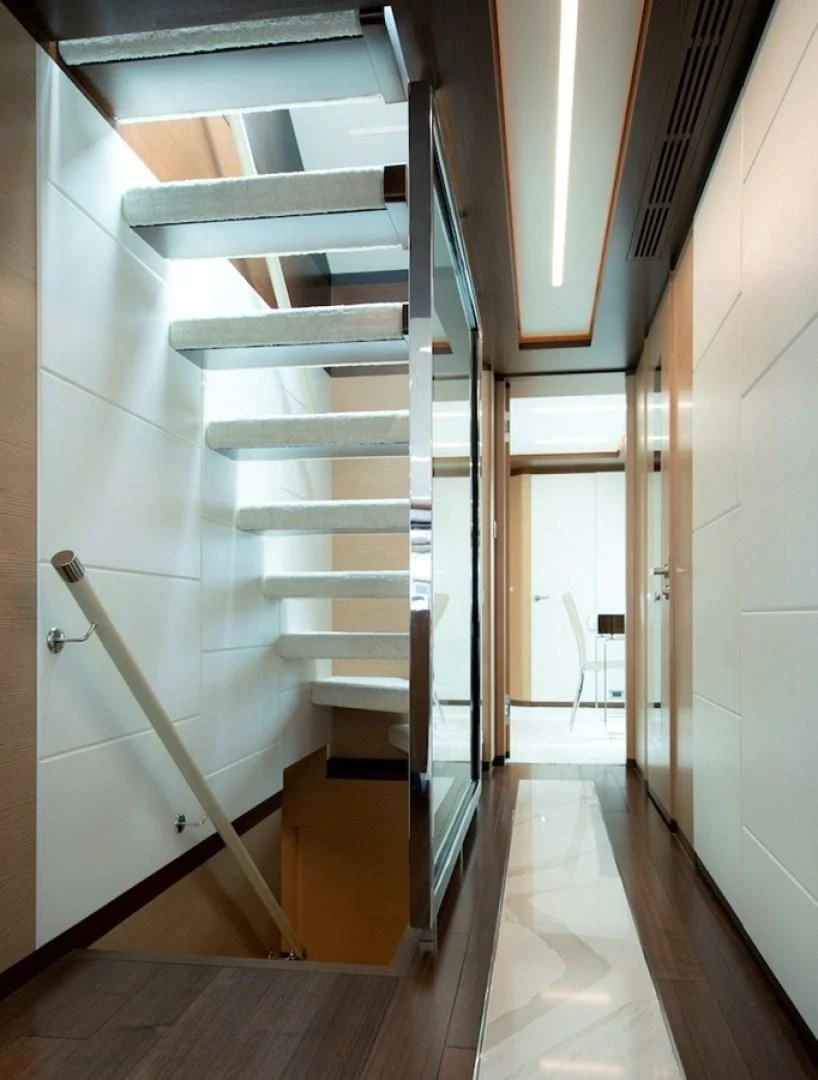 a staircase in a house aboard SEASUITE Yacht for Charter