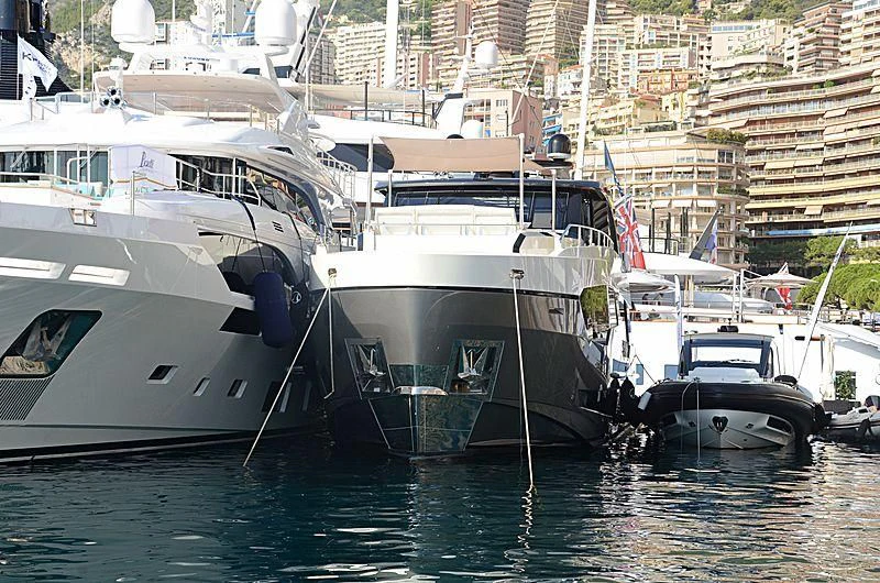 several boats docked in a harbor aboard SEASUITE Yacht for Charter