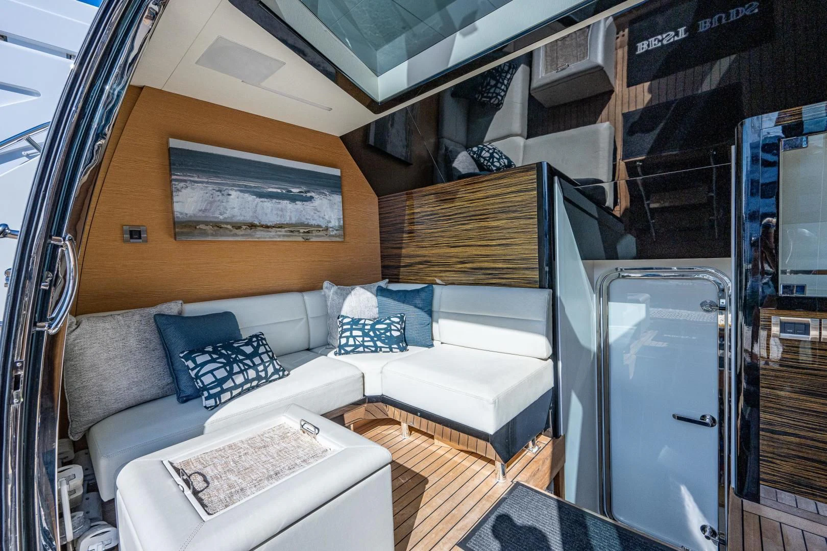 a room with a bed and a couch aboard SEASUITE Yacht for Charter