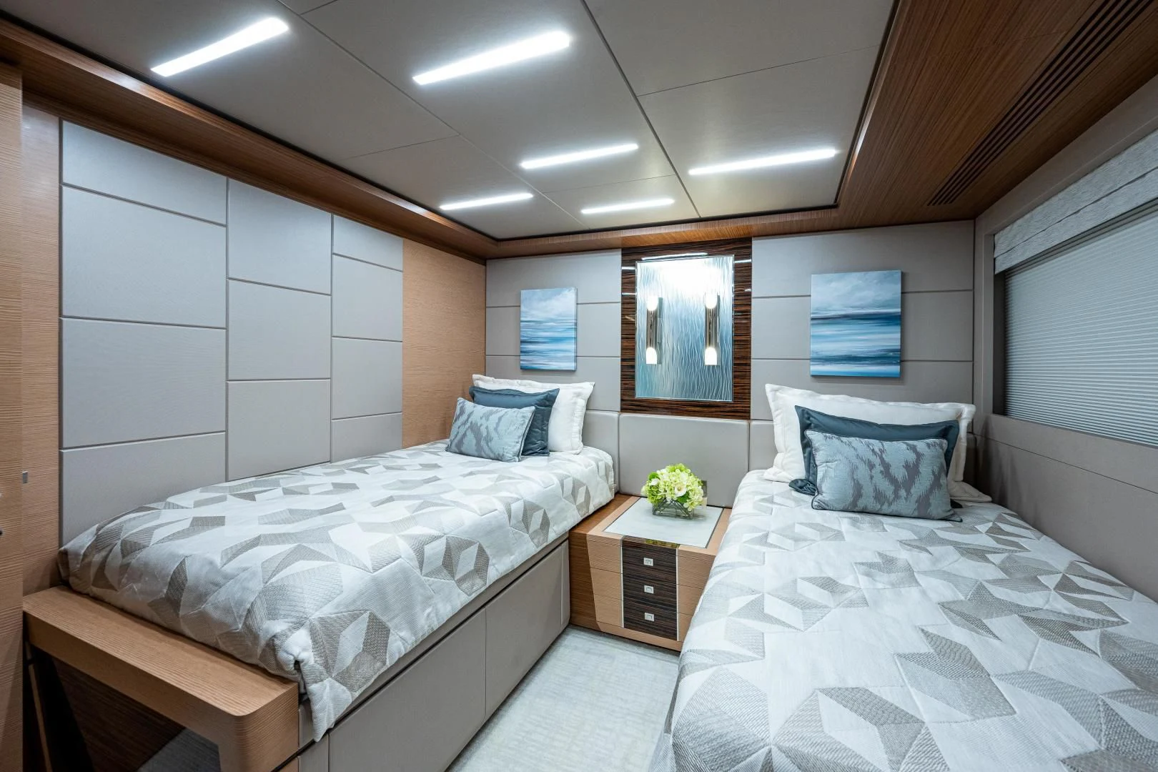 a room with two beds aboard SEASUITE Yacht for Charter