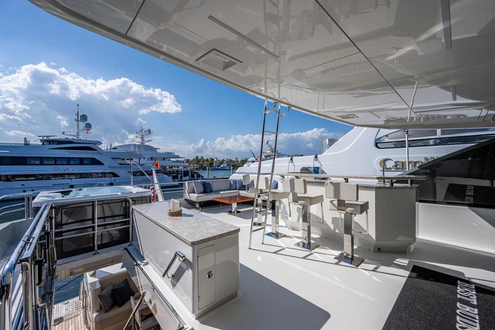 a view of a deck of a boat and a dock aboard SEASUITE Yacht for Charter