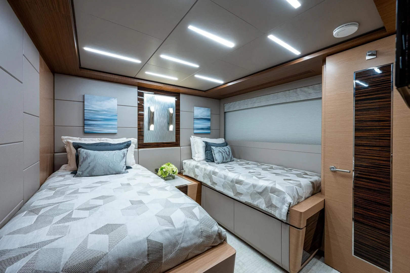 a room with two beds aboard SEASUITE Yacht for Charter