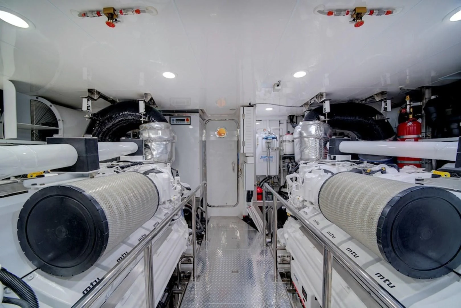a room with several large white machines aboard SEASUITE Yacht for Charter