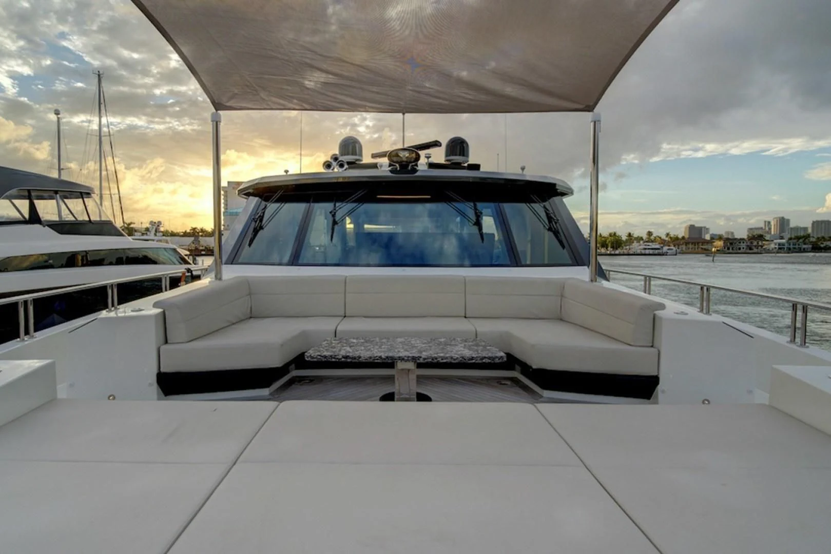 a white car on a boat aboard SEASUITE Yacht for Charter