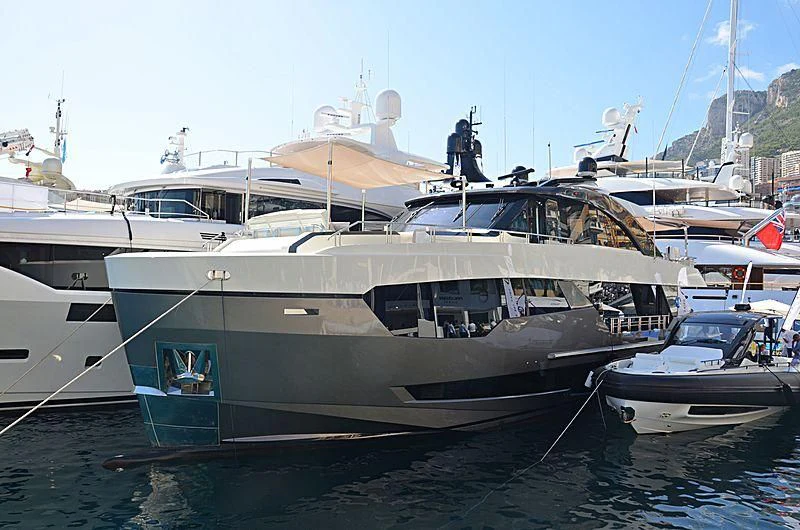 a boat docked at a pier aboard SEASUITE Yacht for Charter