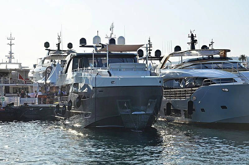 a group of boats in a harbor aboard SEASUITE Yacht for Charter