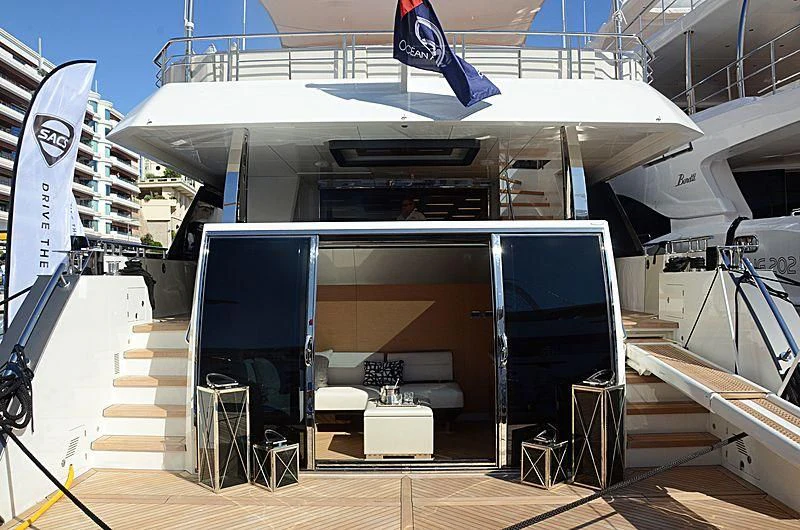 a large white building with a large black screen and a large white and black object on the side aboard SEASUITE Yacht for Charter