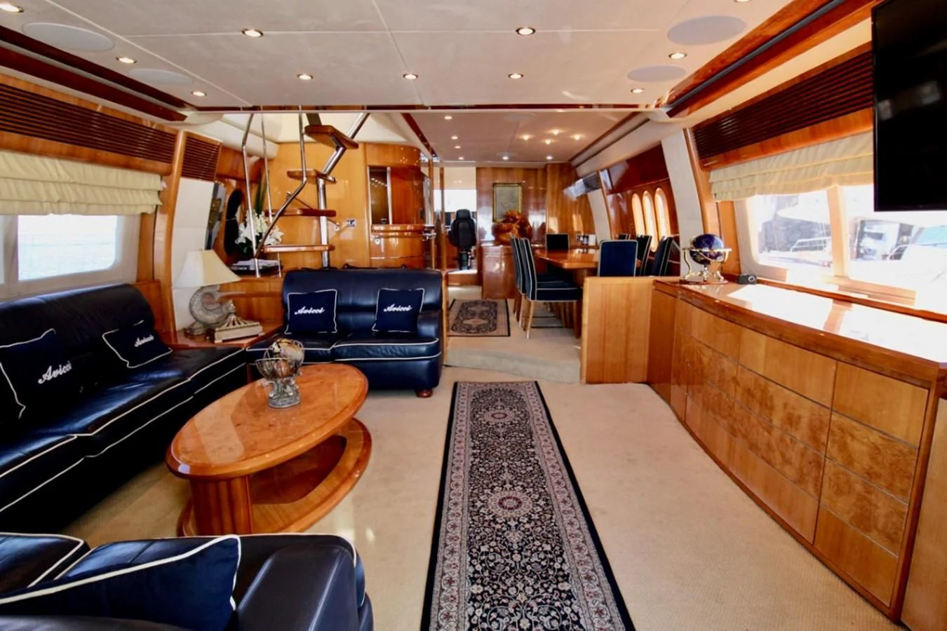 a living room with a large window aboard AVICCI Yacht for Sale