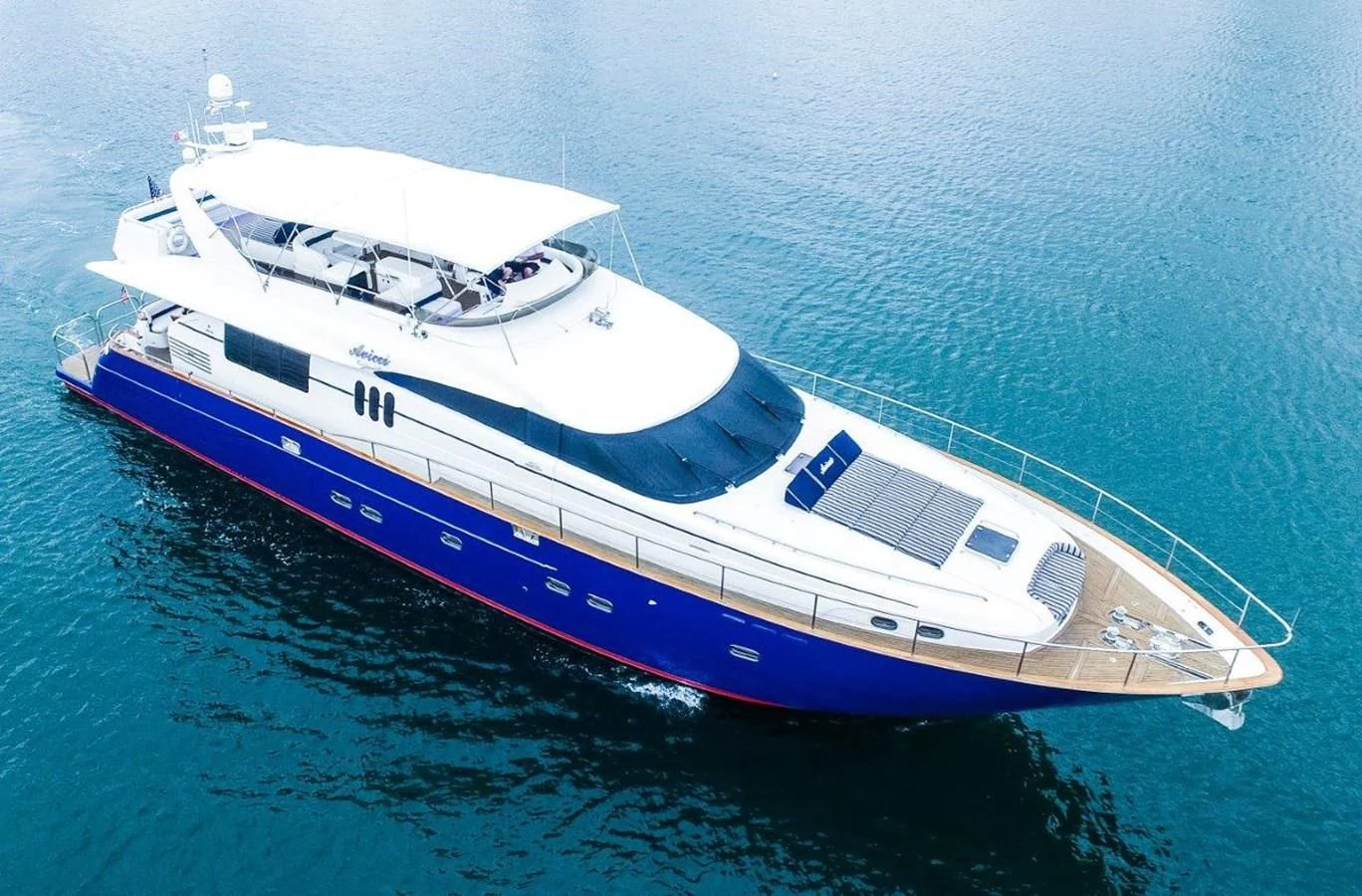 a large white and blue boat aboard AVICCI Yacht for Sale