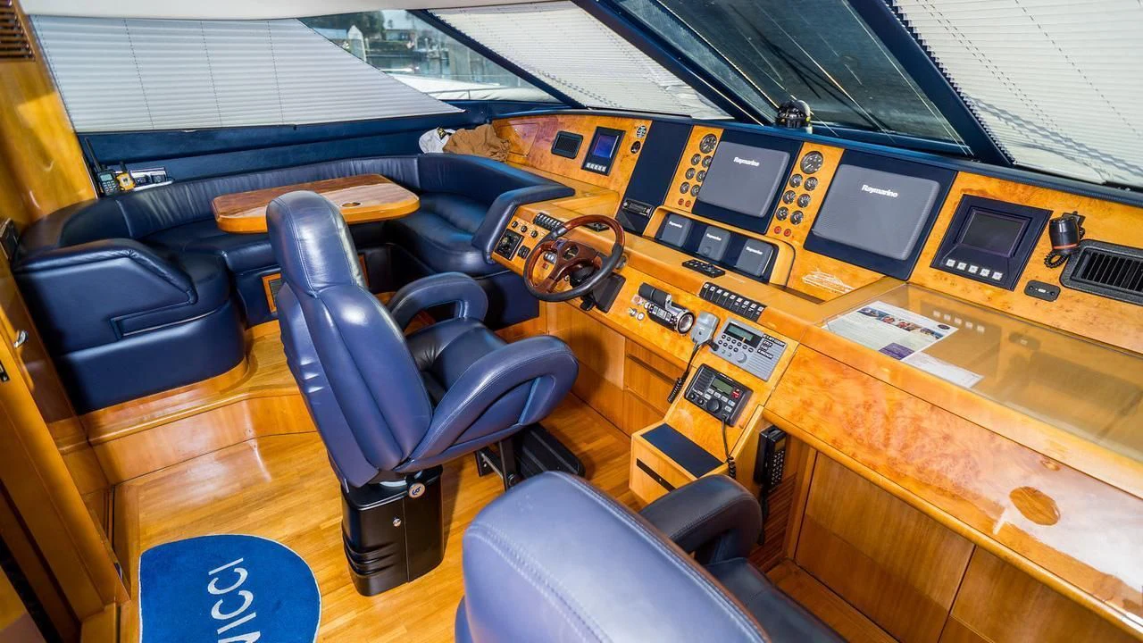 a room with a desk and computer aboard AVICCI Yacht for Sale