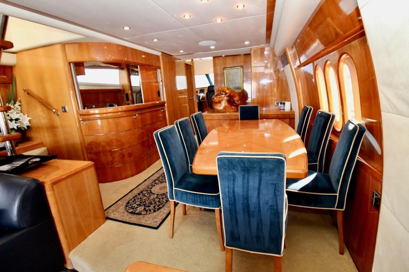 a dining room with a table aboard AVICCI Yacht for Sale