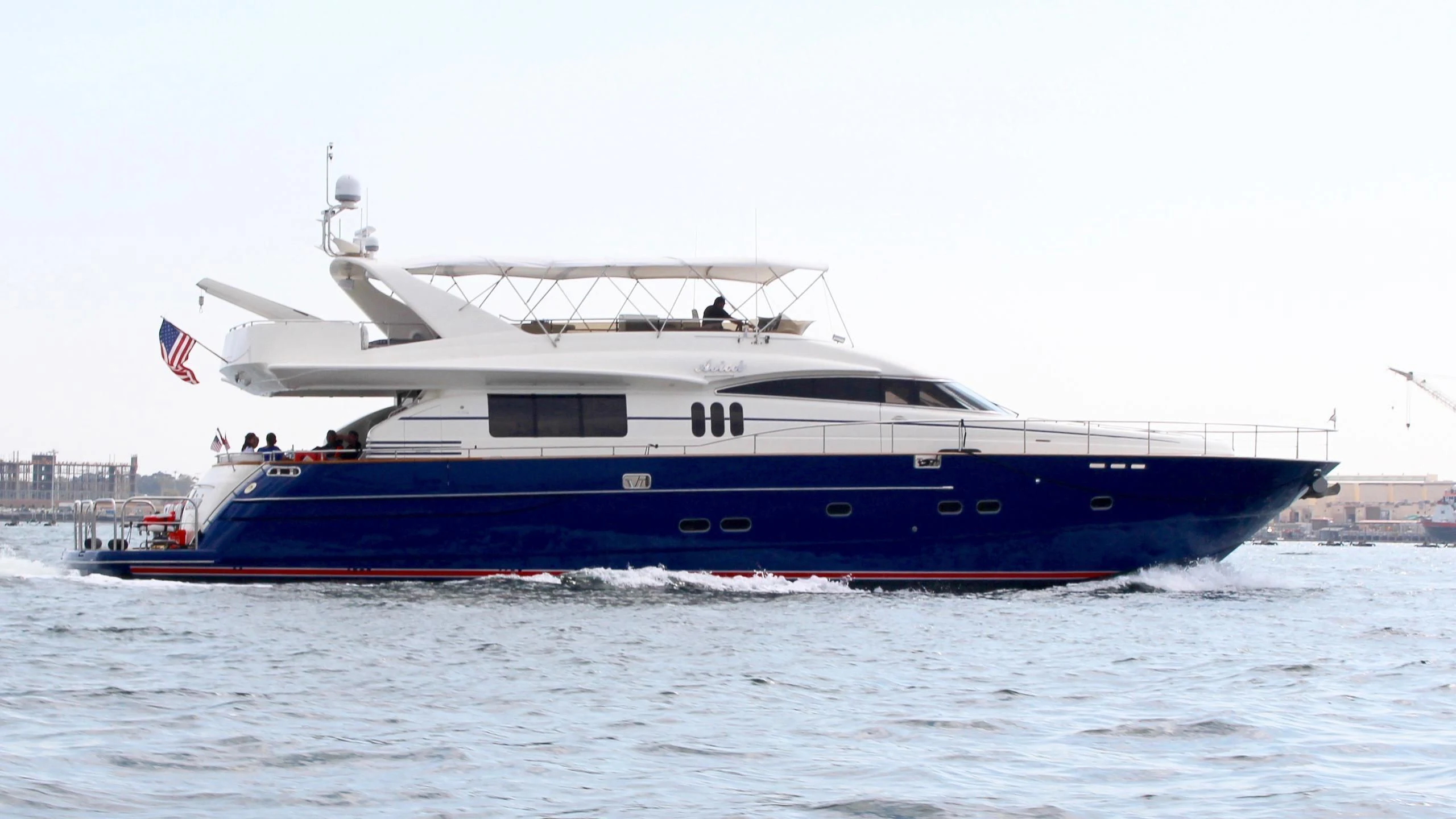 a large boat on the water aboard AVICCI Yacht for Sale