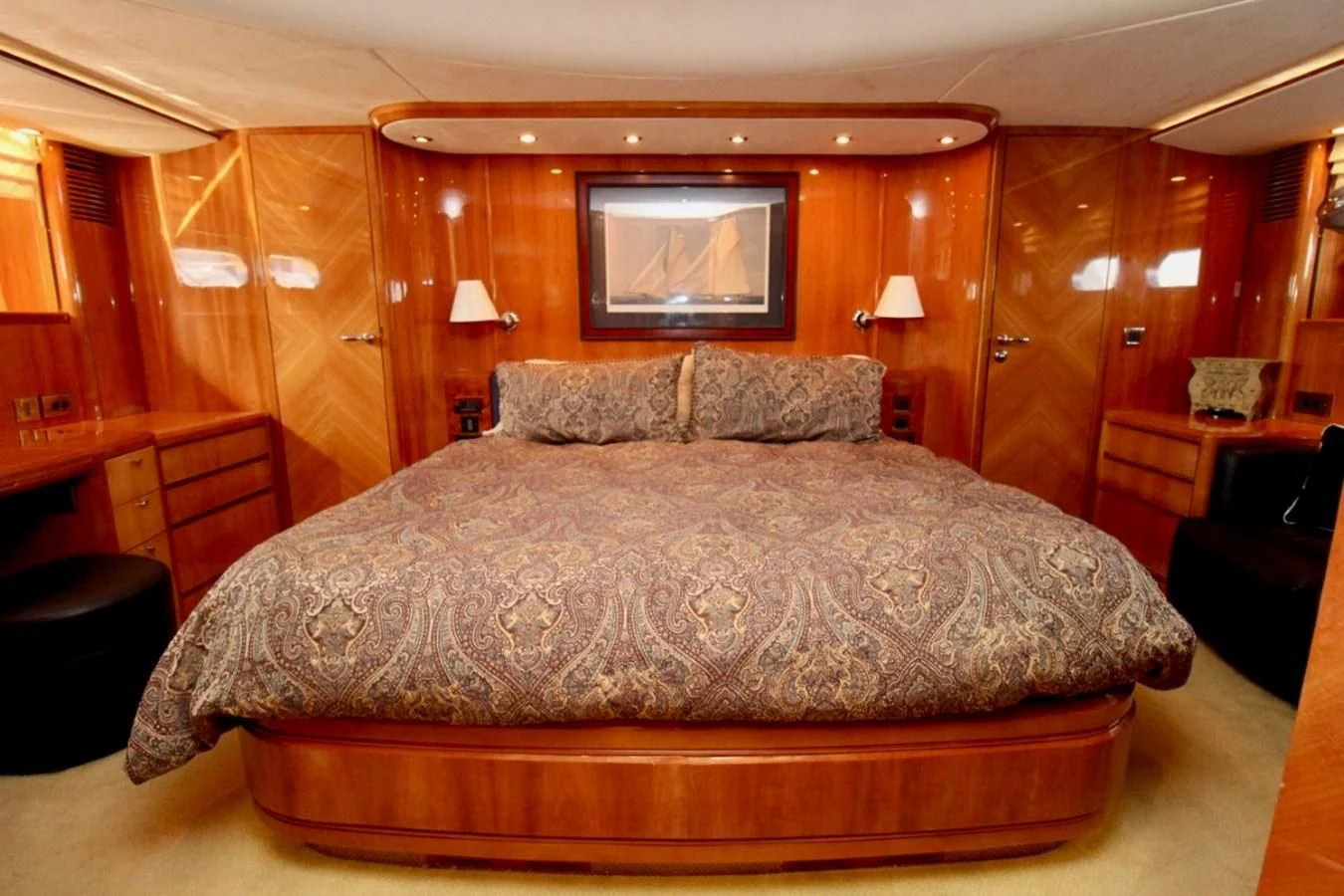 a bed in a room aboard AVICCI Yacht for Sale