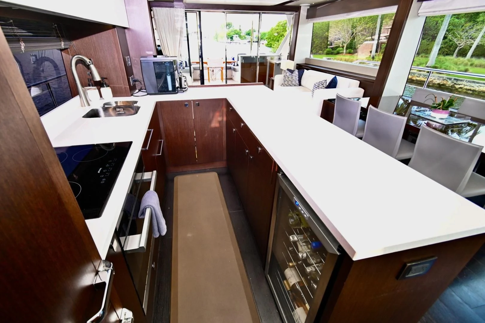 a kitchen with a large island aboard CAESURA Yacht for Sale