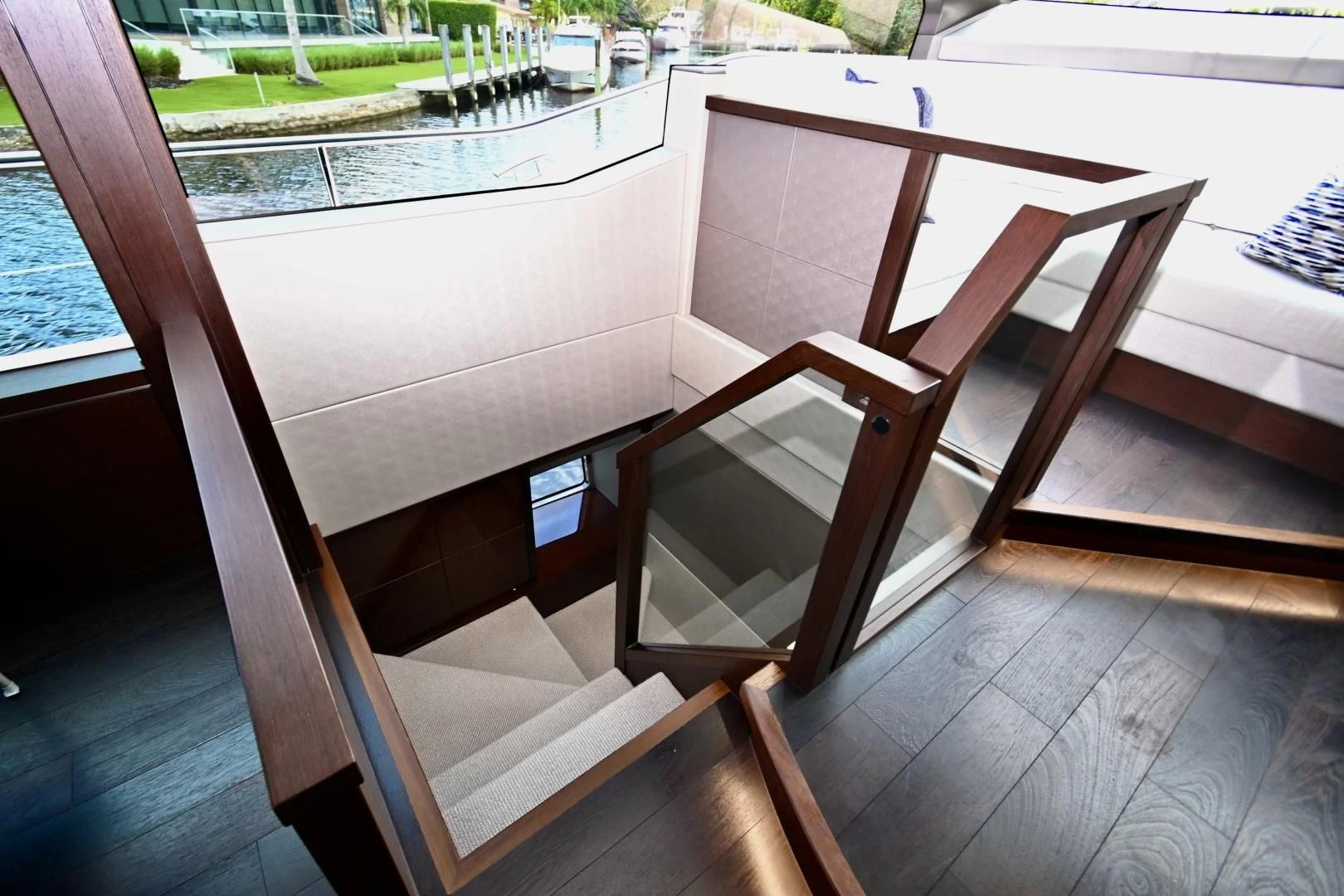 a group of wooden chairs on a deck aboard CAESURA Yacht for Sale