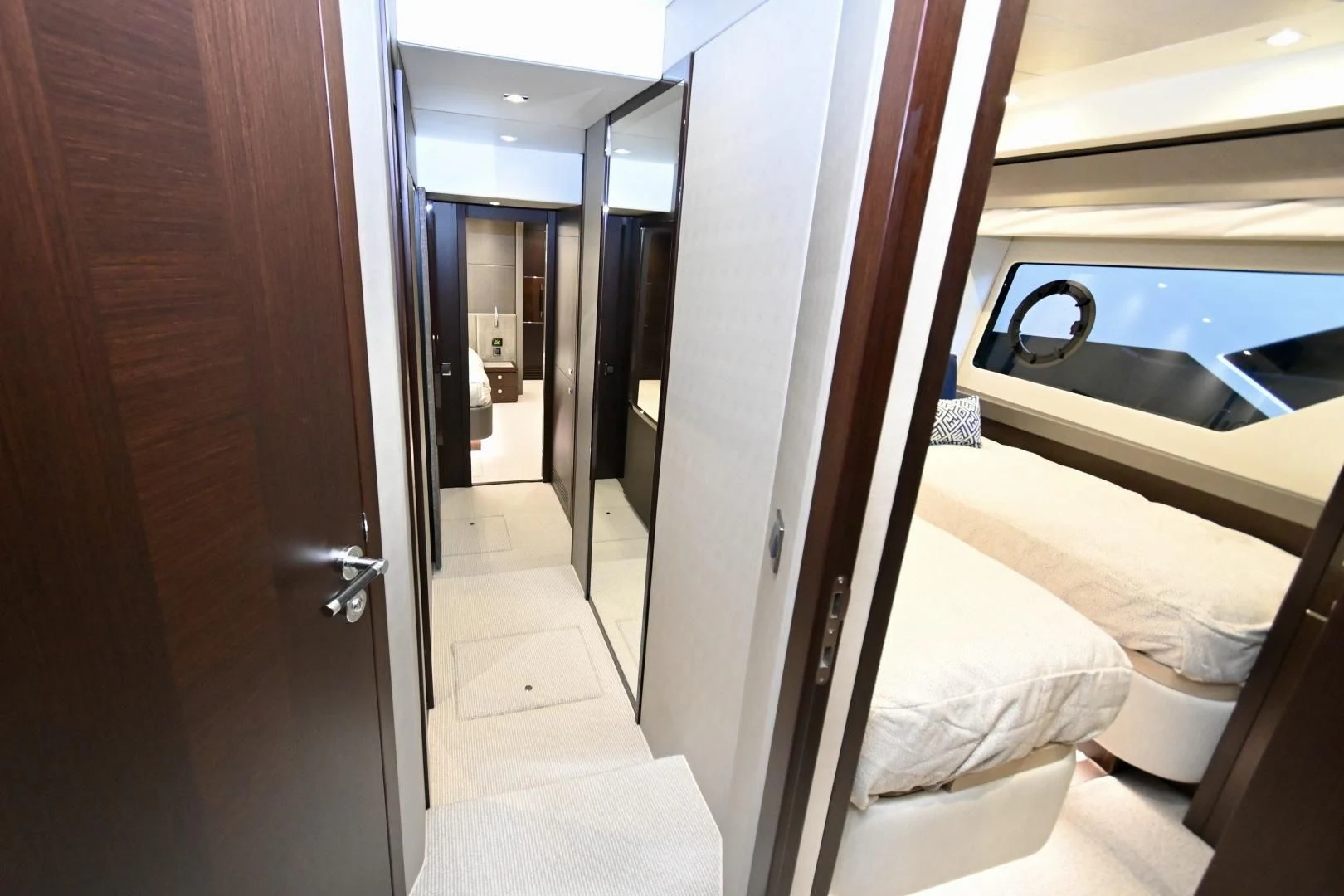 a room with a bed and a sink aboard CAESURA Yacht for Sale