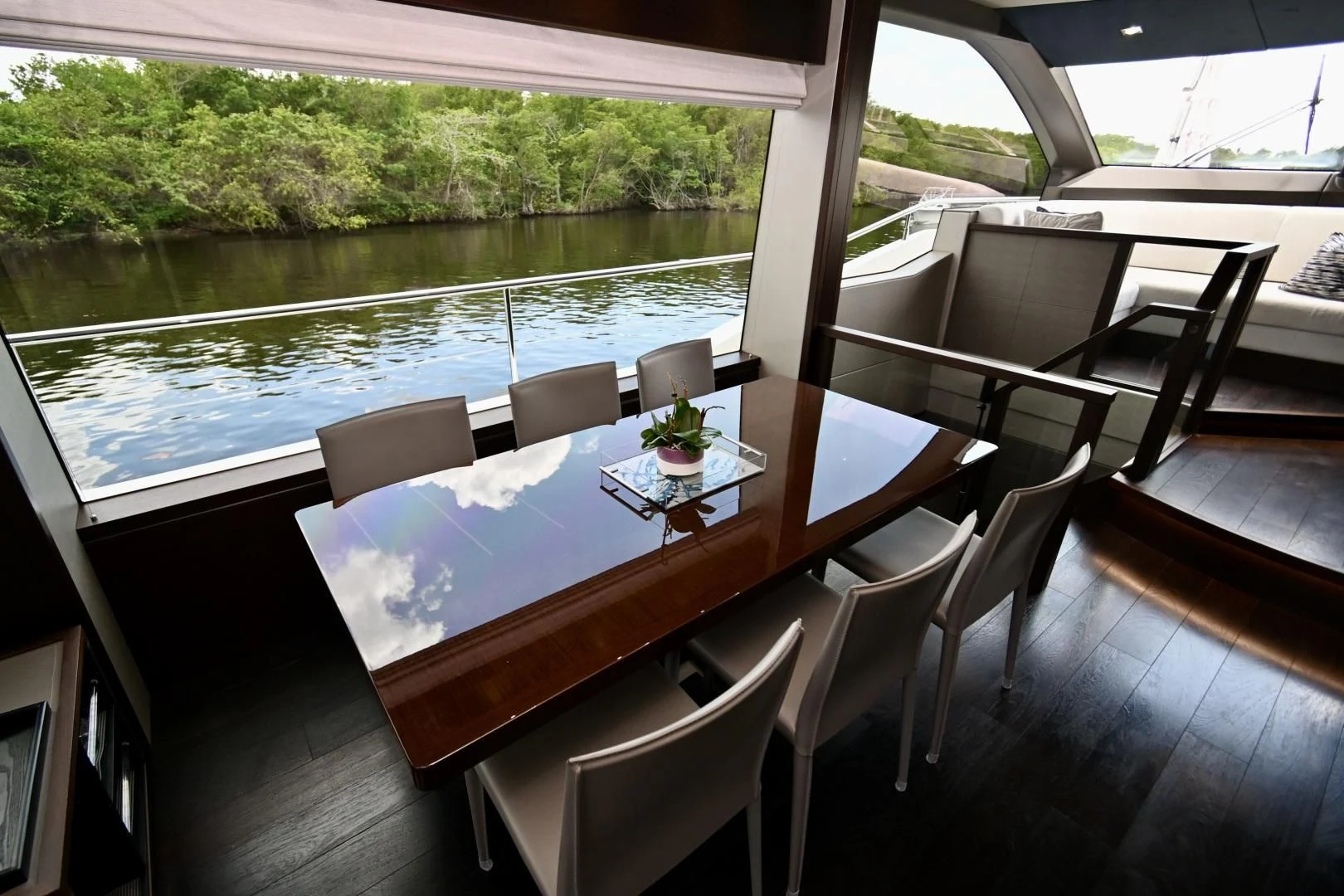 a table with chairs around it aboard CAESURA Yacht for Sale