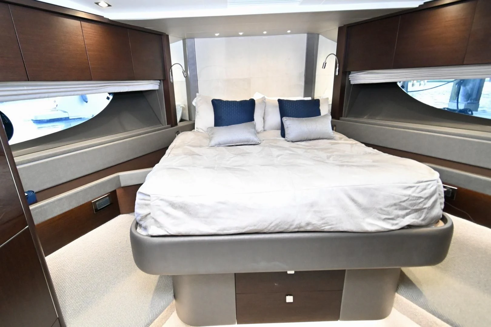 a room with a bed and a window aboard CAESURA Yacht for Sale
