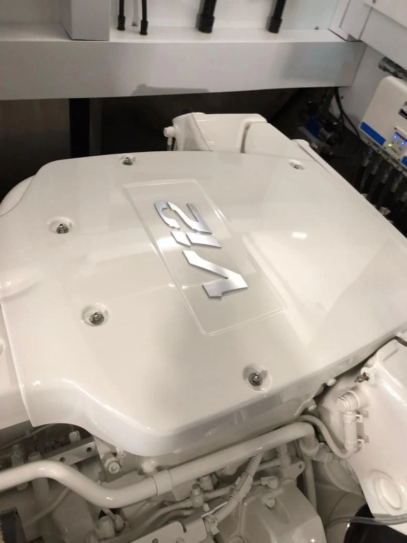 a white machine with a small metal handle aboard CAESURA Yacht for Sale