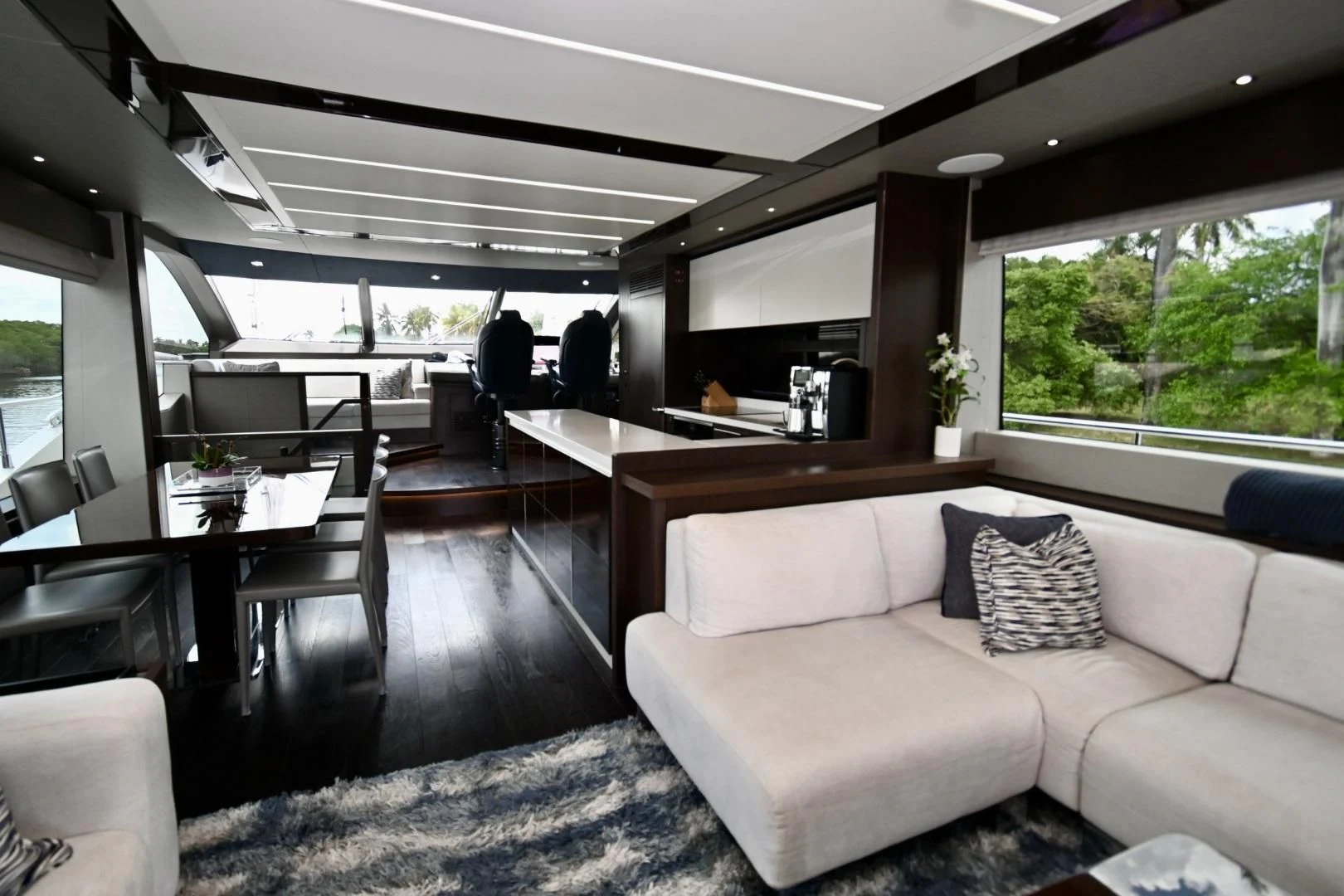 a living room with a couch and a tv aboard CAESURA Yacht for Sale