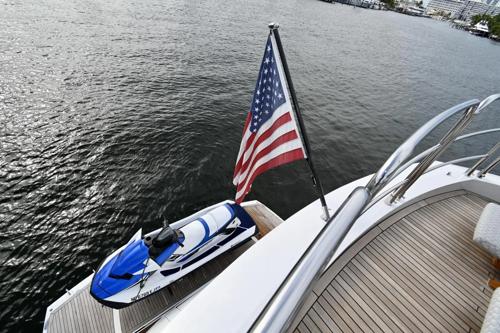 a boat with a flag on it aboard CAESURA Yacht for Sale