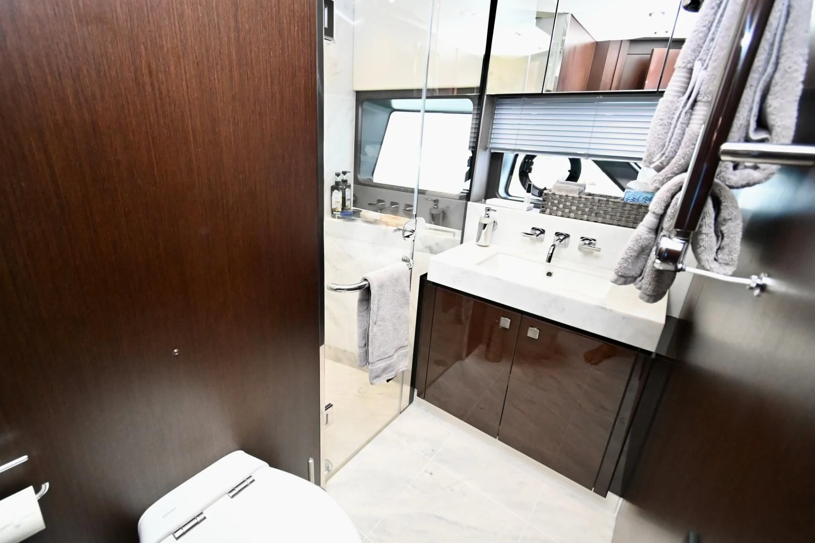 a person in a kitchen aboard CAESURA Yacht for Sale