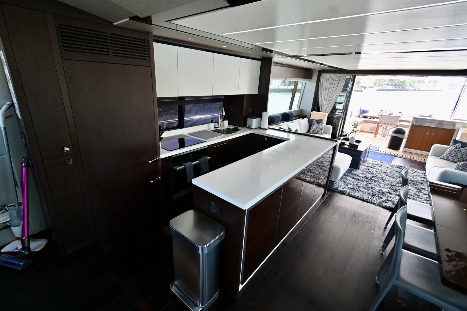 a kitchen with a large island aboard CAESURA Yacht for Sale