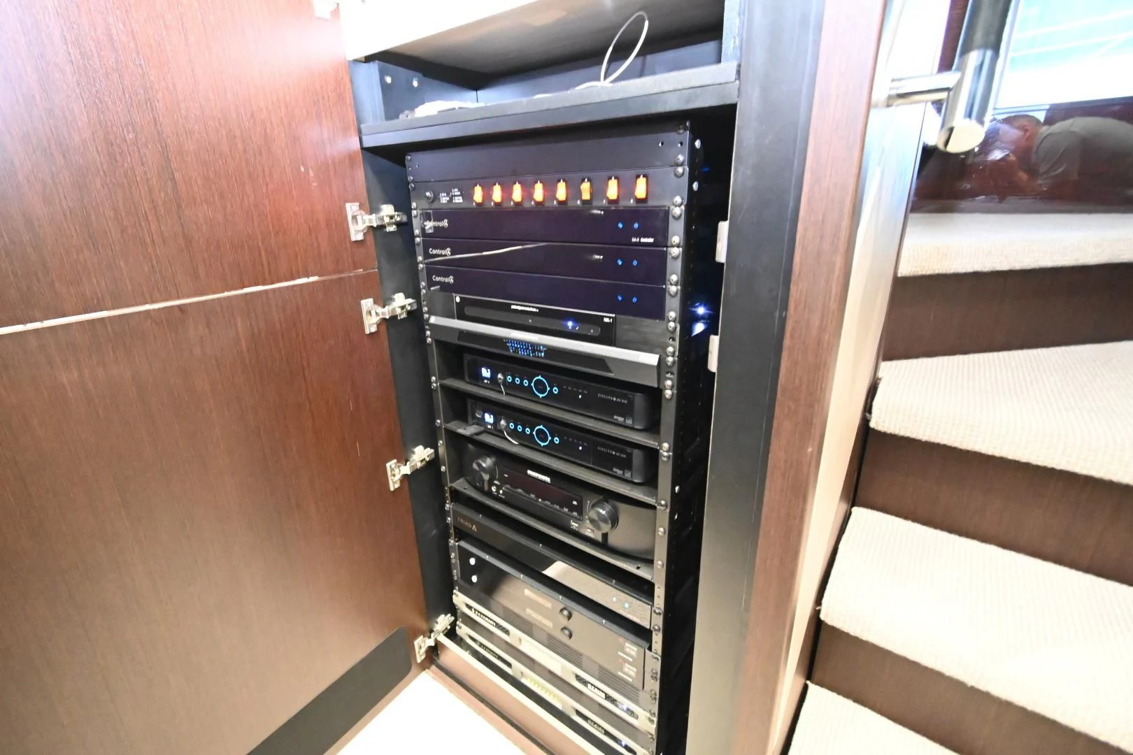 a black and silver cabinet with a white door and drawers aboard CAESURA Yacht for Sale