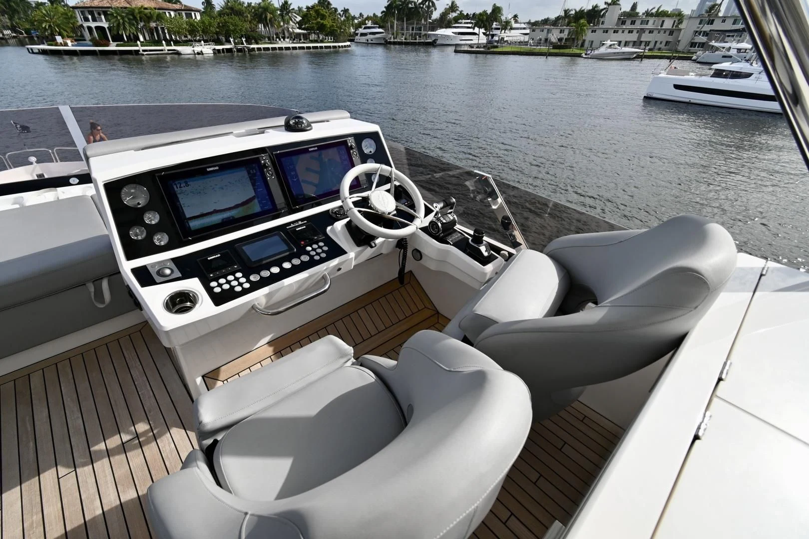 a boat with a steering wheel and a steering wheel on the front aboard CAESURA Yacht for Sale