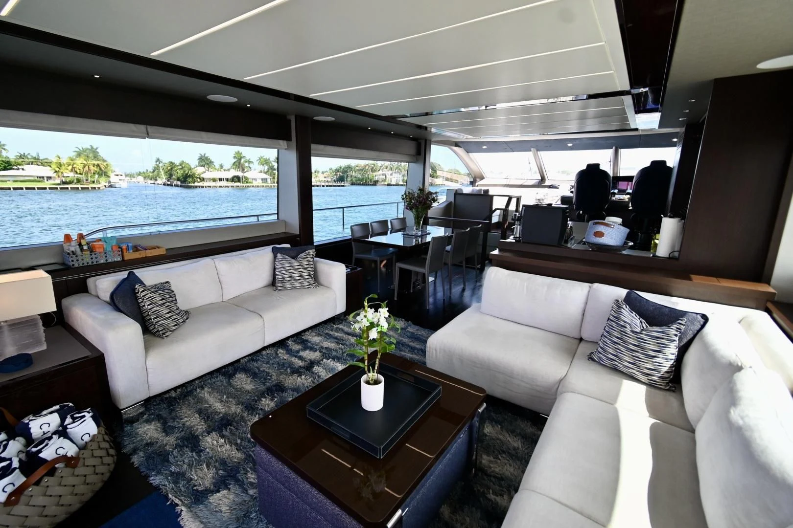a living room with a large window aboard CAESURA Yacht for Sale