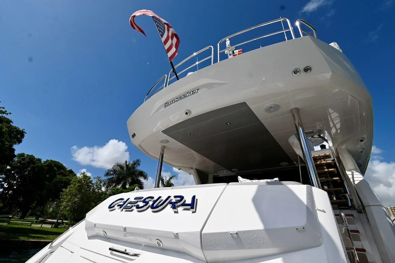 a large white airplane with a flag on top aboard CAESURA Yacht for Sale