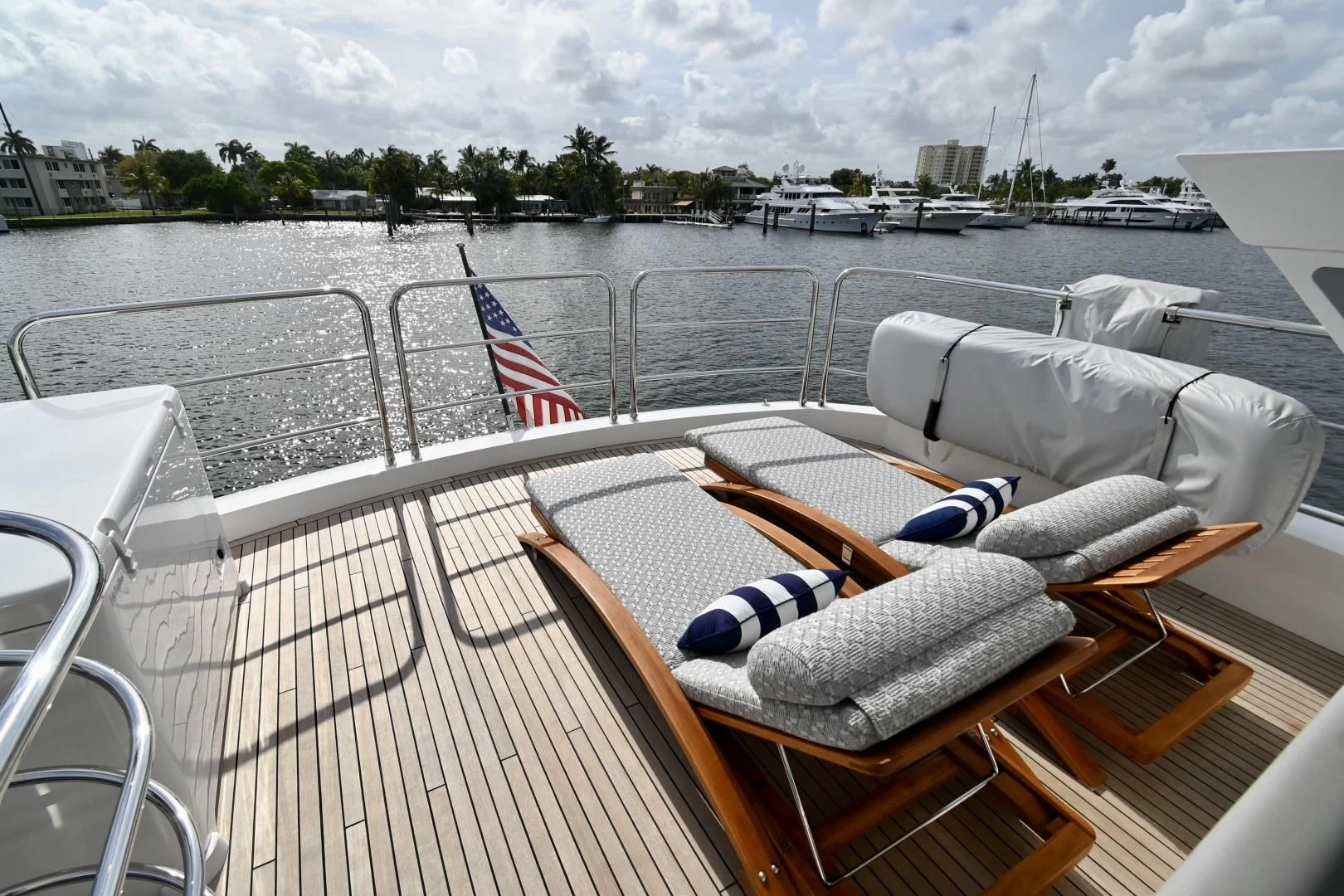 a boat with a flag on the front aboard CAESURA Yacht for Sale