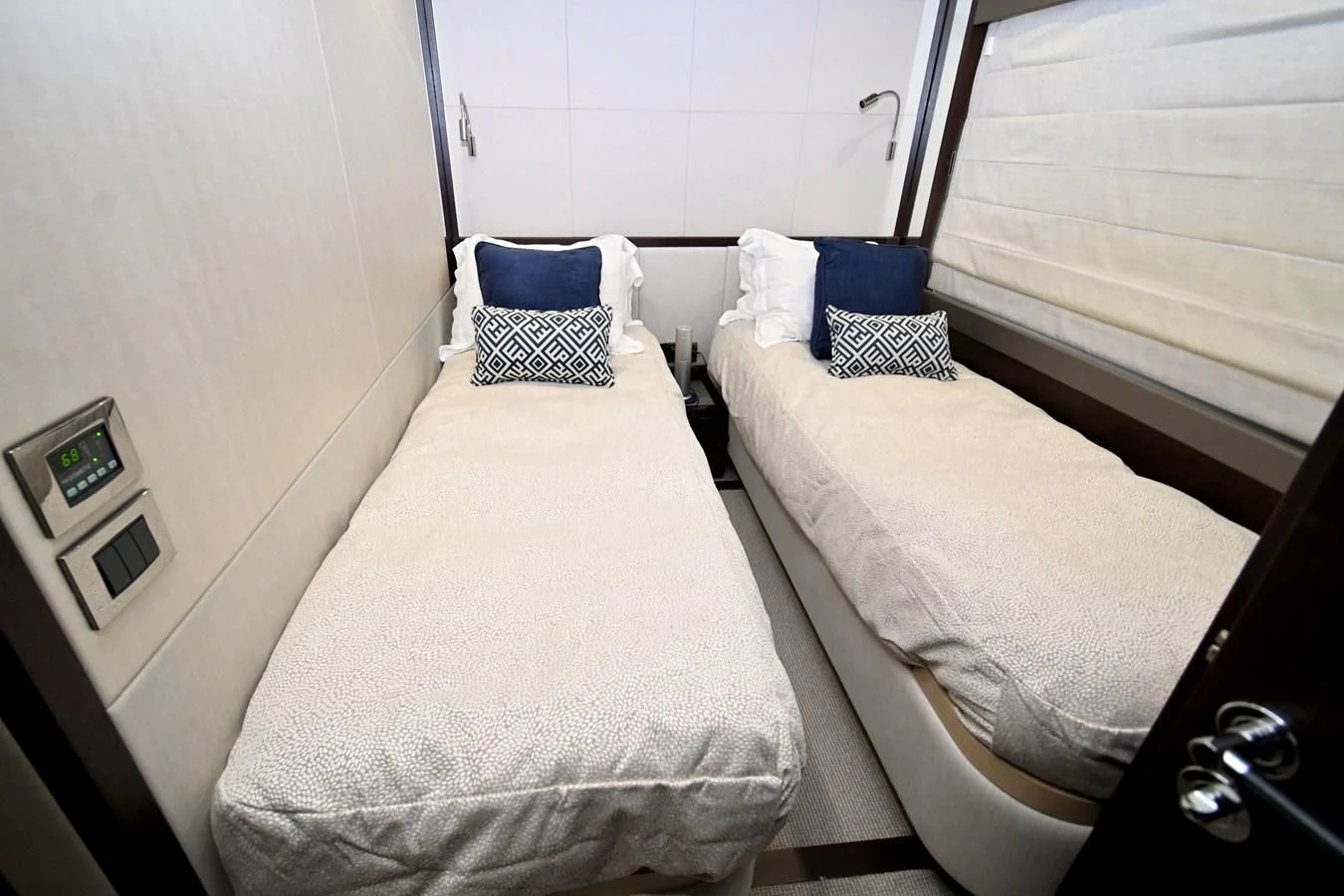 a couple of beds in a room aboard CAESURA Yacht for Sale
