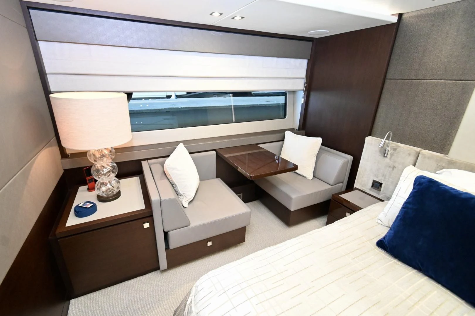 a room with a bed and a window aboard CAESURA Yacht for Sale