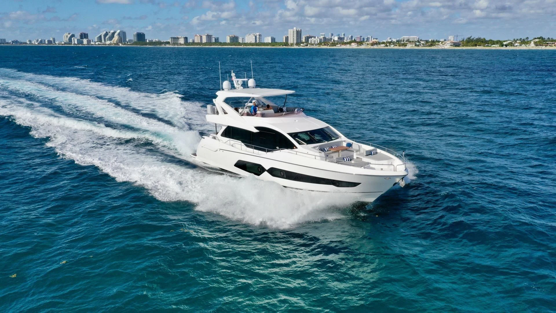 a white yacht on the water aboard CAESURA Yacht for Sale