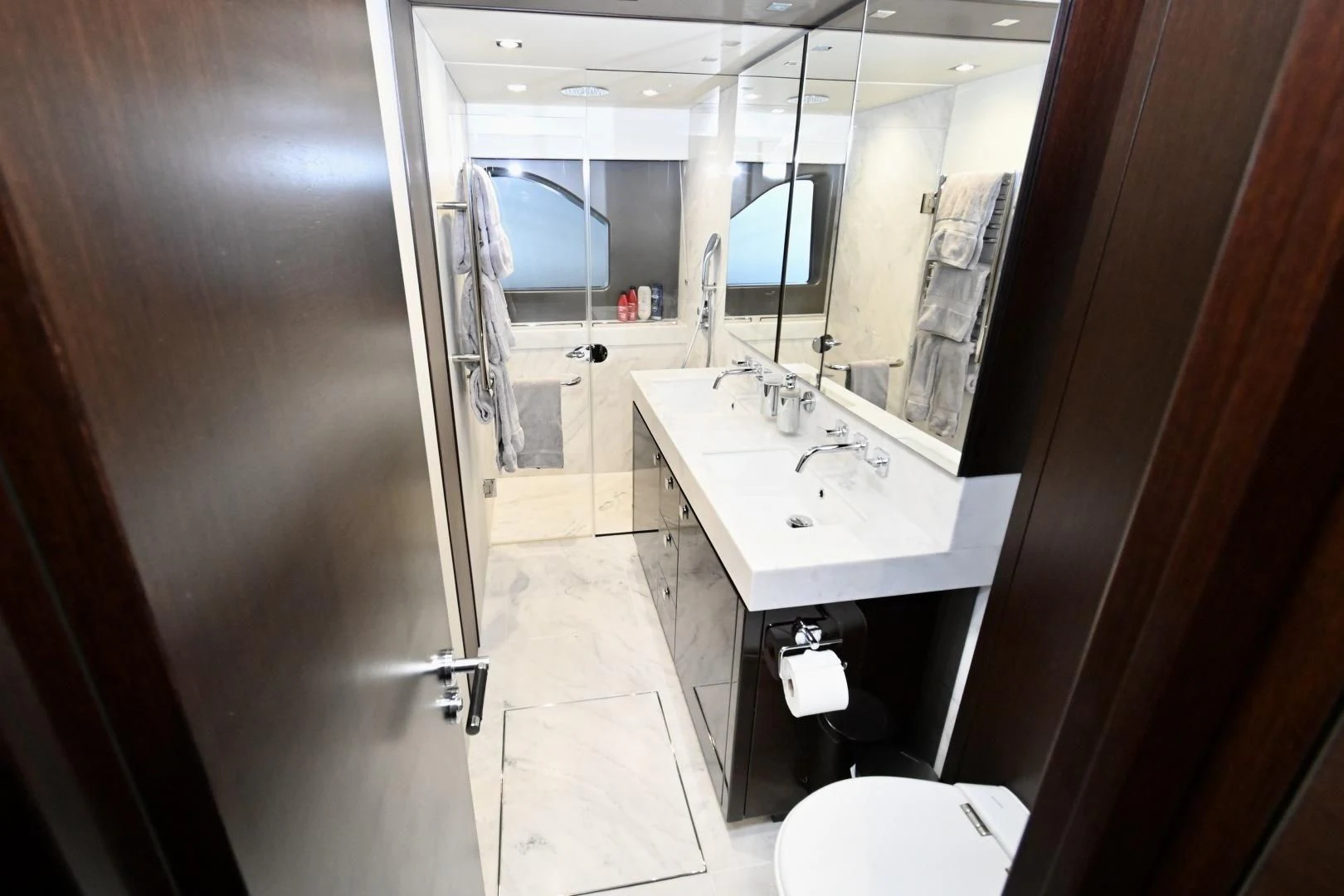 a bathroom with a sink and a mirror aboard CAESURA Yacht for Sale