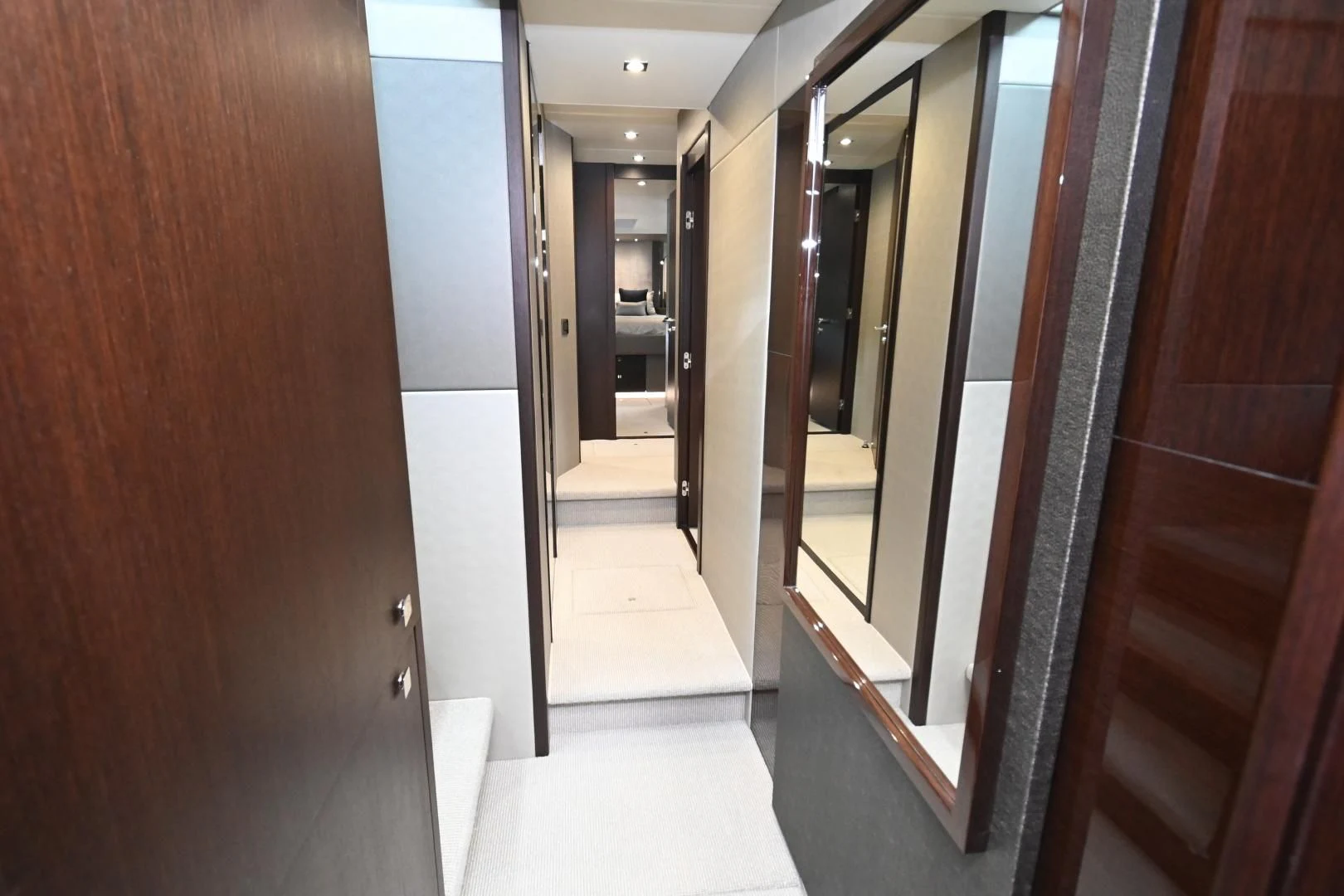 a hallway with doors aboard CAESURA Yacht for Sale