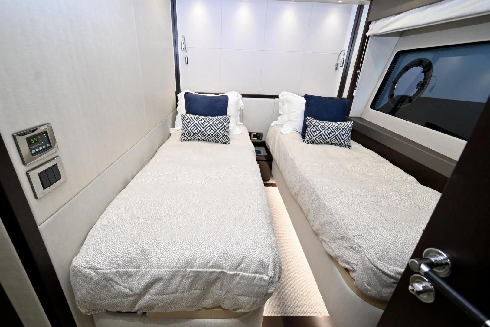 a couple of beds in a room aboard CAESURA Yacht for Sale