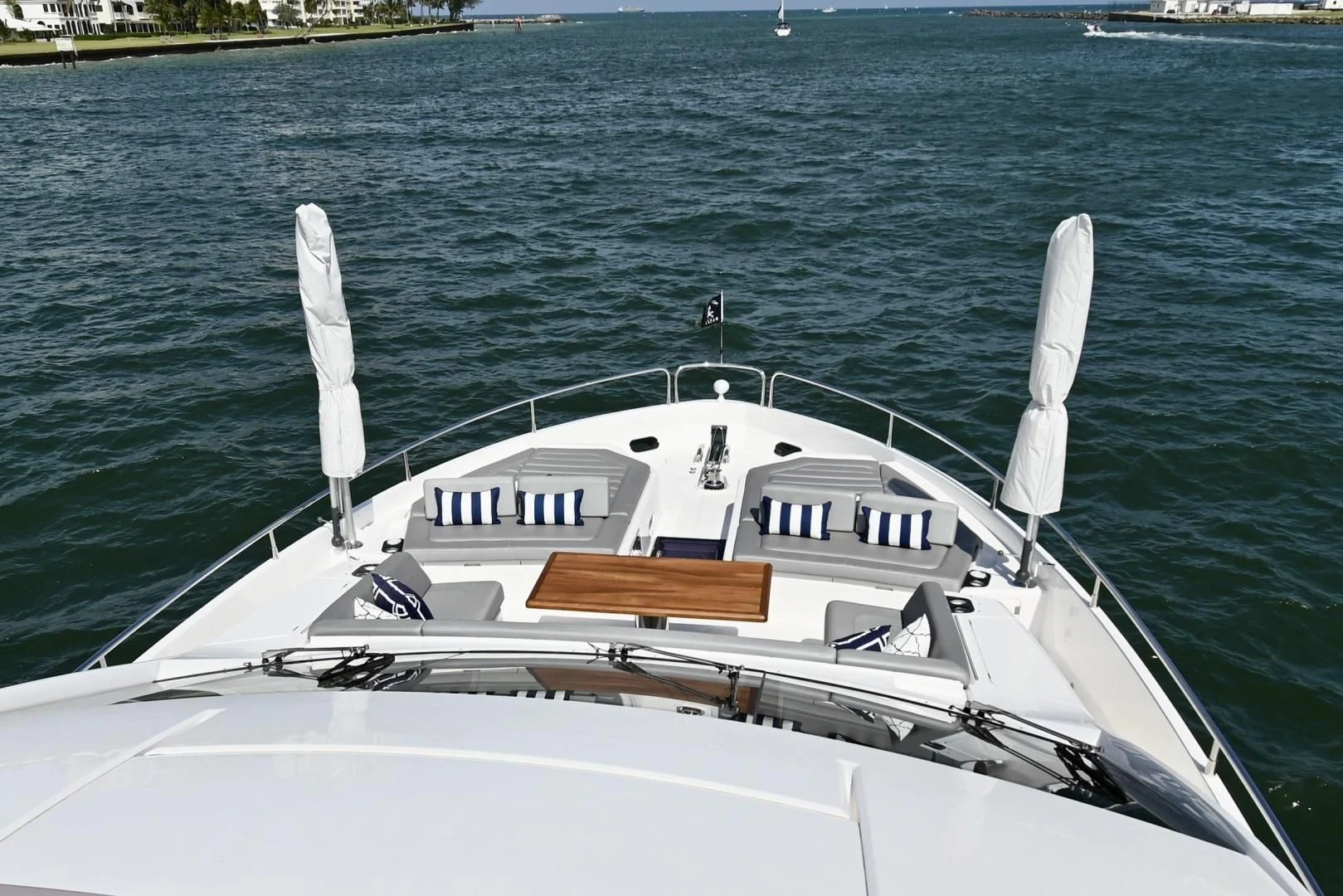 a white boat in the water aboard CAESURA Yacht for Sale