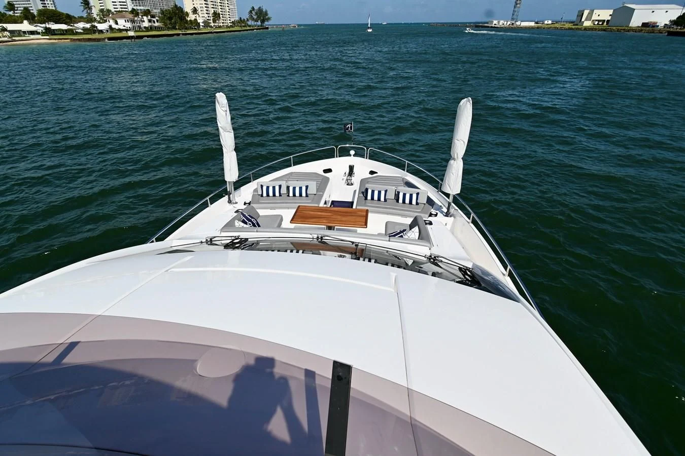 a white boat in the water aboard CAESURA Yacht for Sale