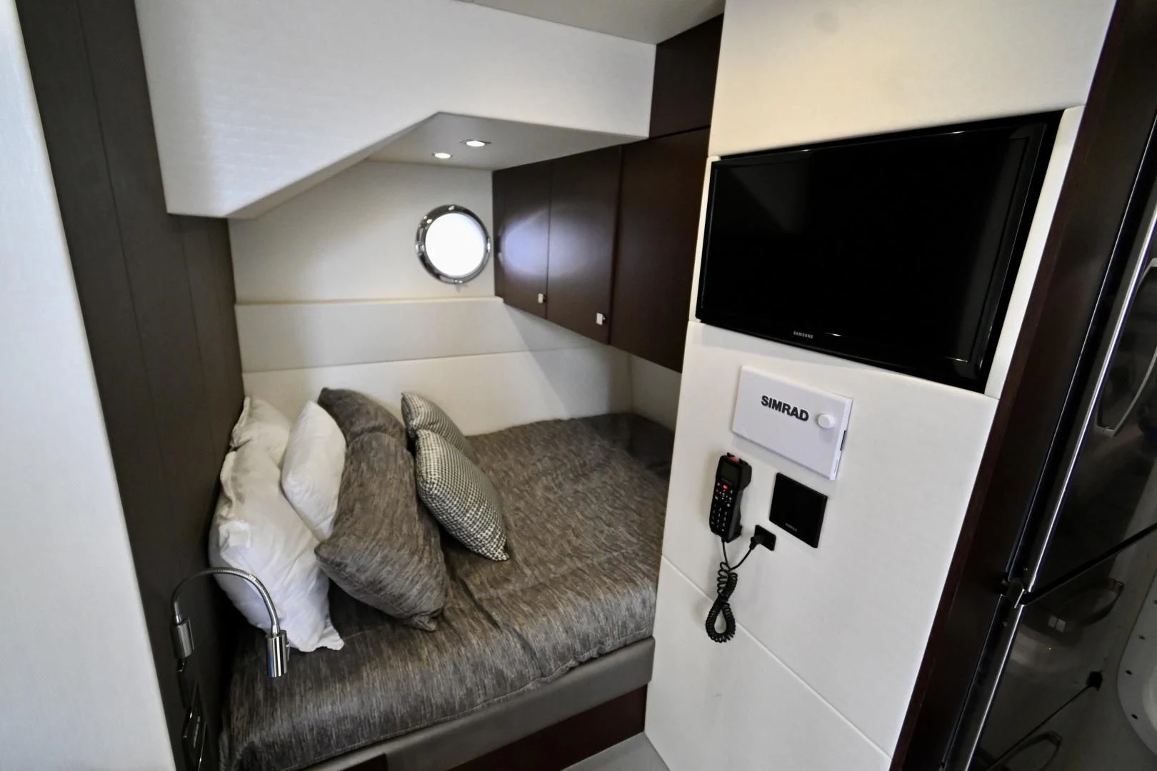 a tv on a couch aboard CAESURA Yacht for Sale