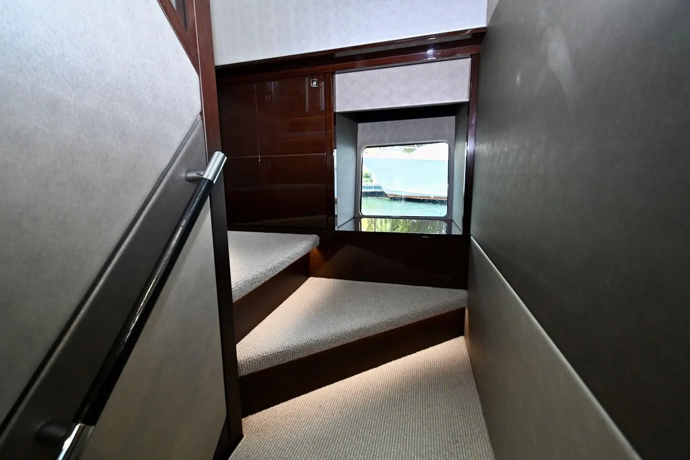 a room with a window and a bed aboard CAESURA Yacht for Sale