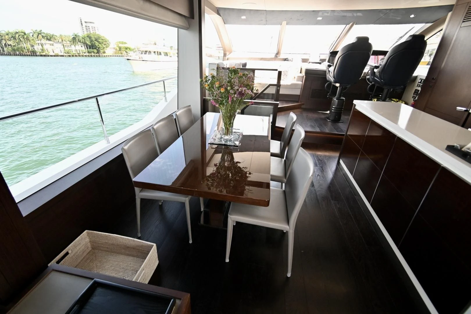 a room with a table and chairs aboard CAESURA Yacht for Sale