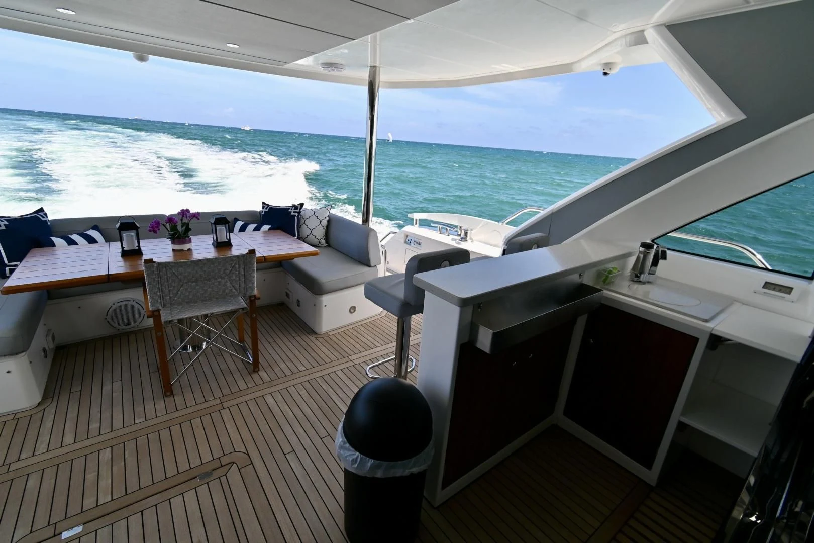 a room with a table and chairs aboard CAESURA Yacht for Sale