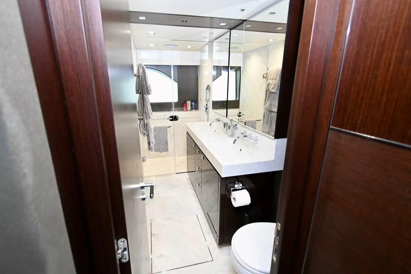 a bathroom with a sink and a toilet aboard CAESURA Yacht for Sale