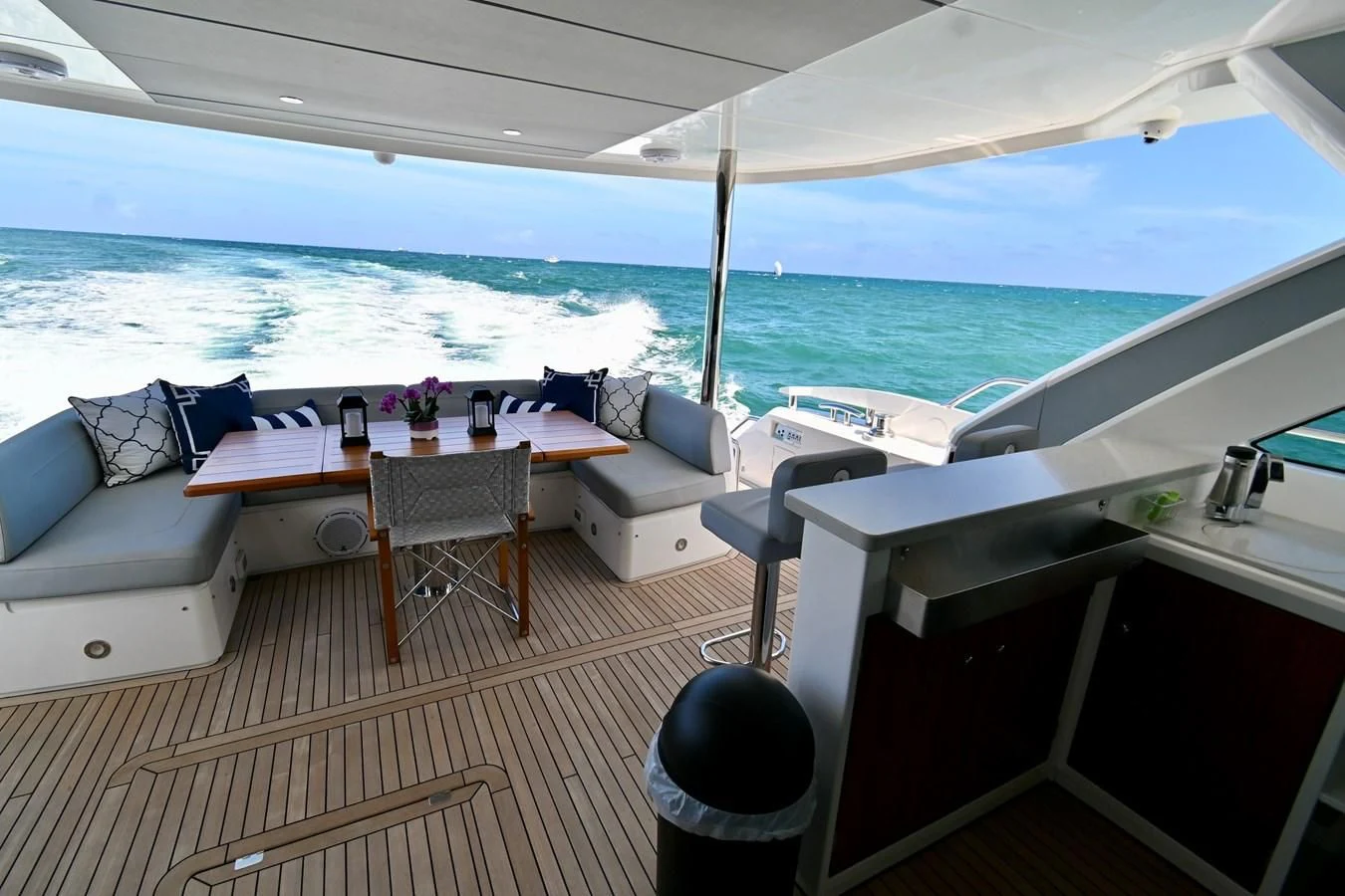 a room with a table and chairs aboard CAESURA Yacht for Sale