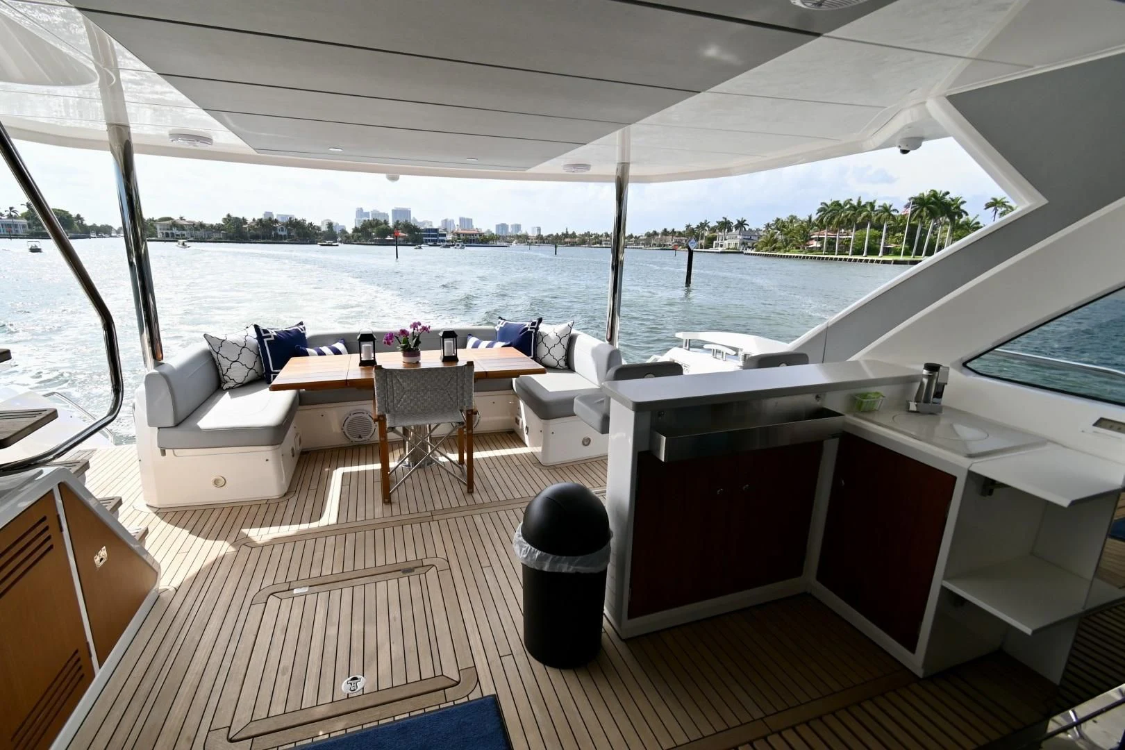 a boat with a table and chairs aboard CAESURA Yacht for Sale