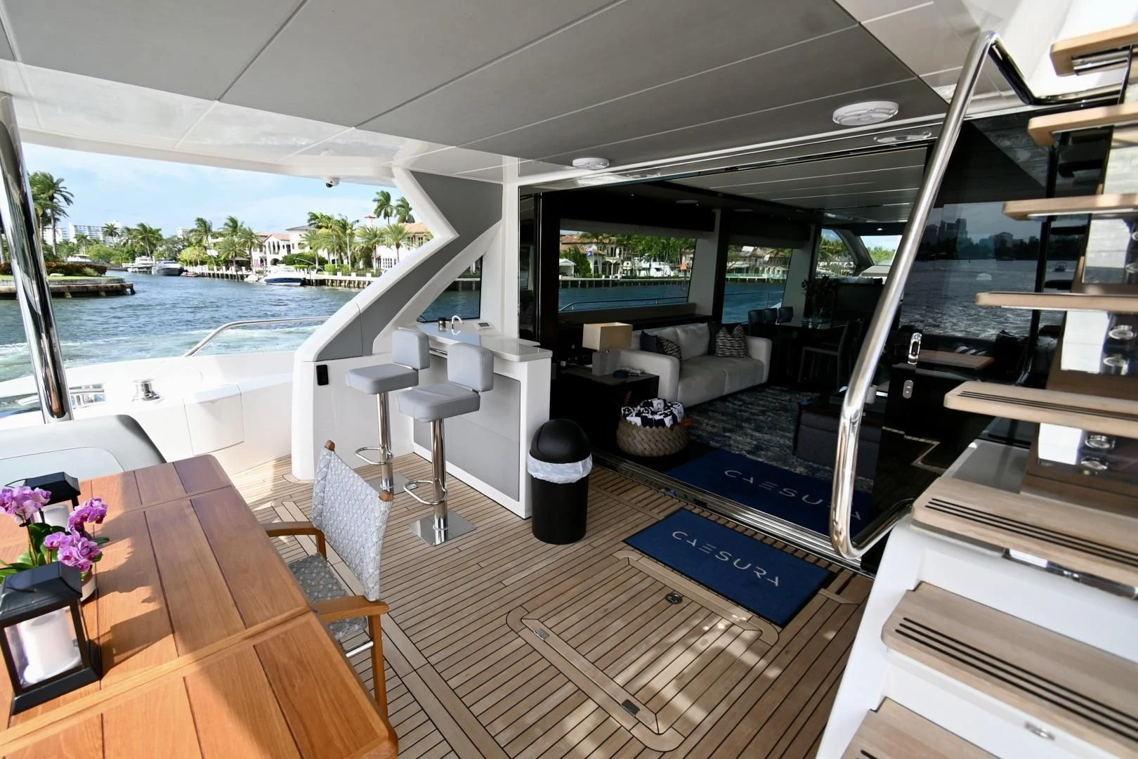 a room with a table and chairs aboard CAESURA Yacht for Sale