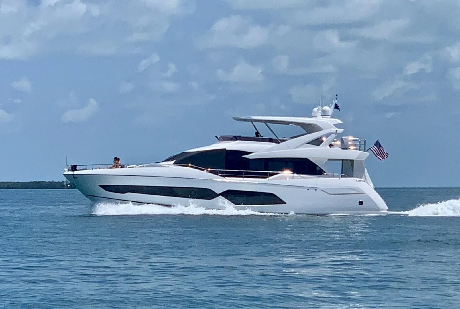 a white yacht on the water aboard CAESURA Yacht for Sale