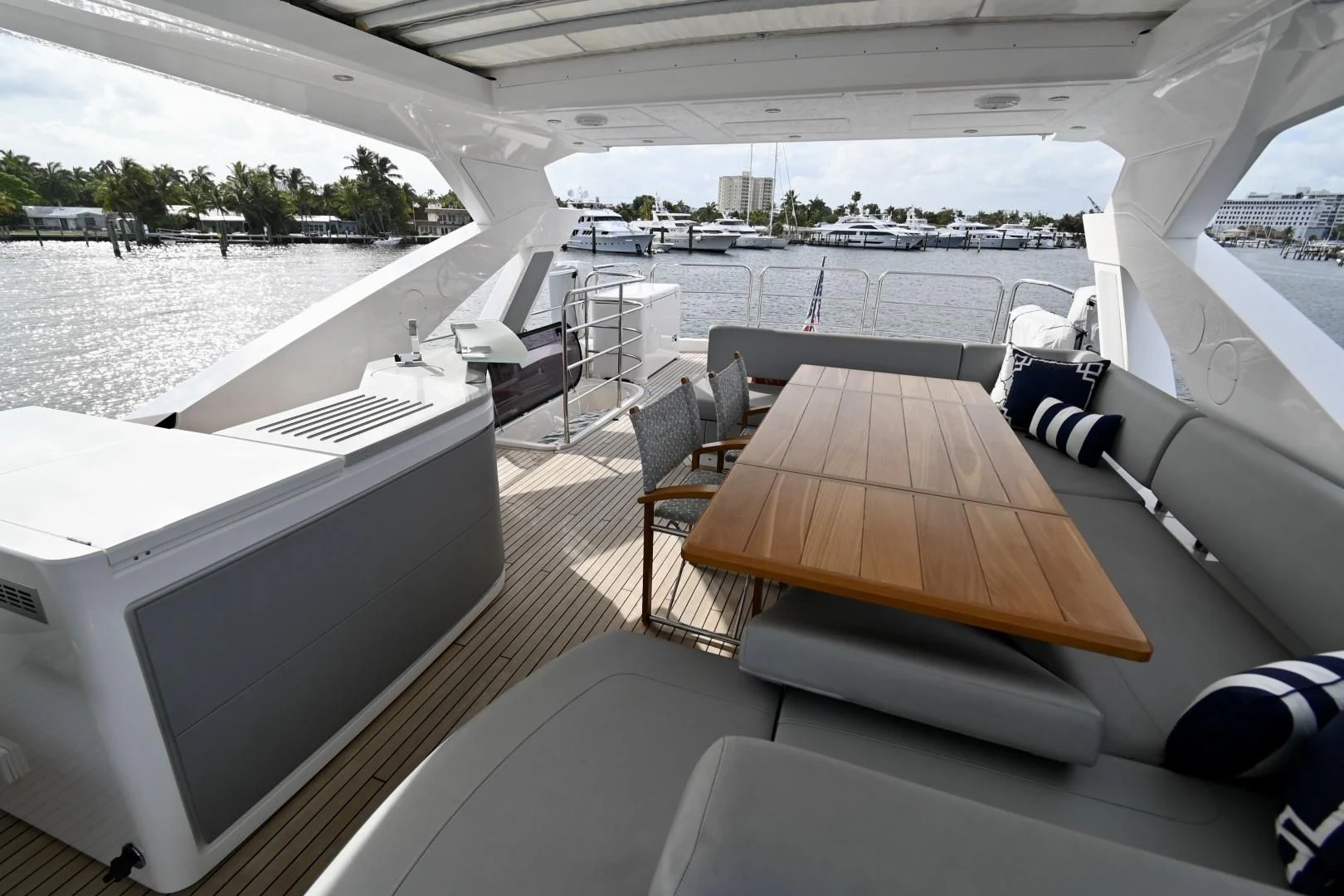 a room with a table and chairs aboard CAESURA Yacht for Sale